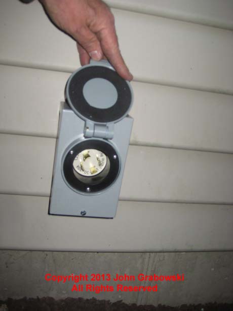Generator inlet is a 30 amp 4 prong twist lock plug