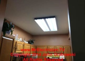 2' x 4' fluorescent kitchen light fixture before removal