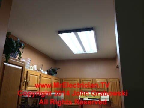 2' x 4' fluorescent kitchen light fixture before removal