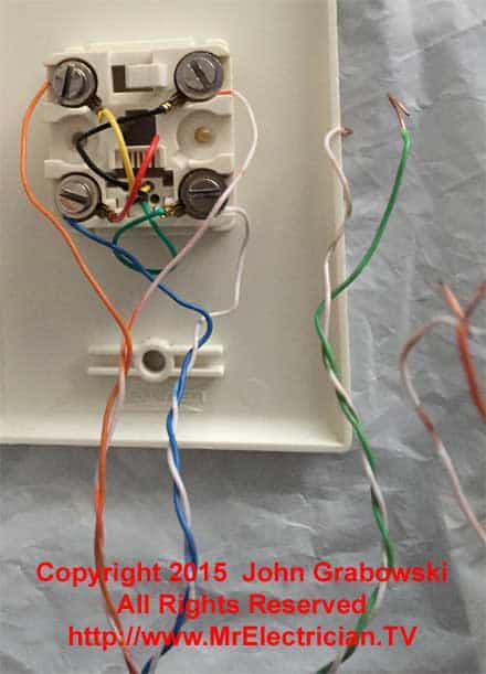 The blue pair and the orange pair are both connected to the telephone jack according to the telephone wiring color code