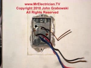 Three way and two way switch wiring with no load or line feed entering the switch box. The hot wire is spliced at the other end onto the black wire. The white wire on the 14/3 cable has been taped with blue electrical tape to show that it is not a neutral conductor, but a traveler. The red wire is the other traveler.