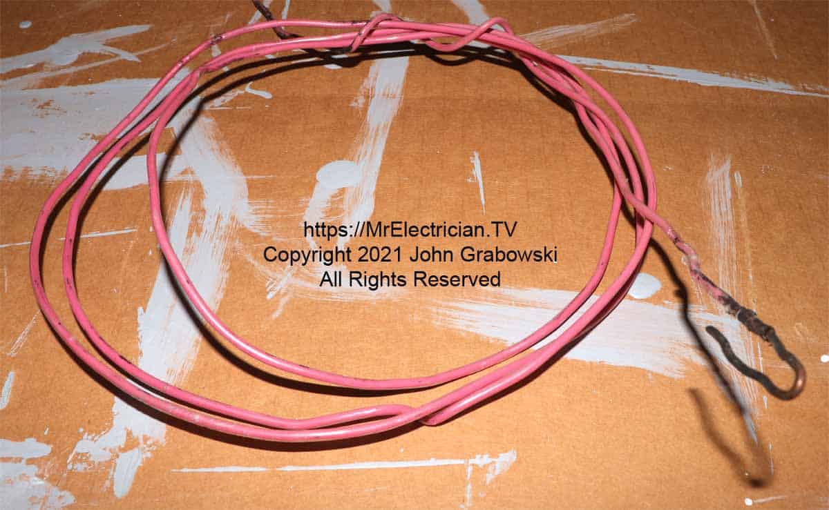 A short piece of number 12 copper wire for fishing and hooking wires