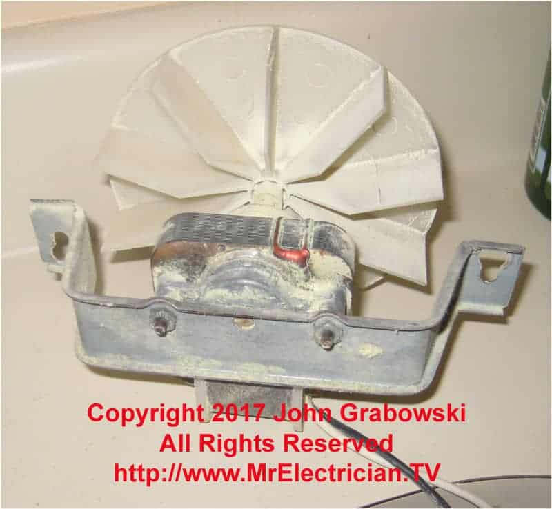 A simple old bathroom exhaust fan motor with the impeller blade attached