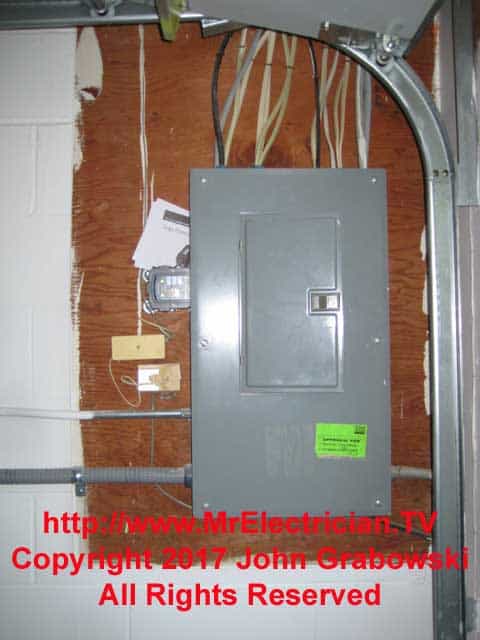 Main electrical panel with a surge protection device mounted to the left side