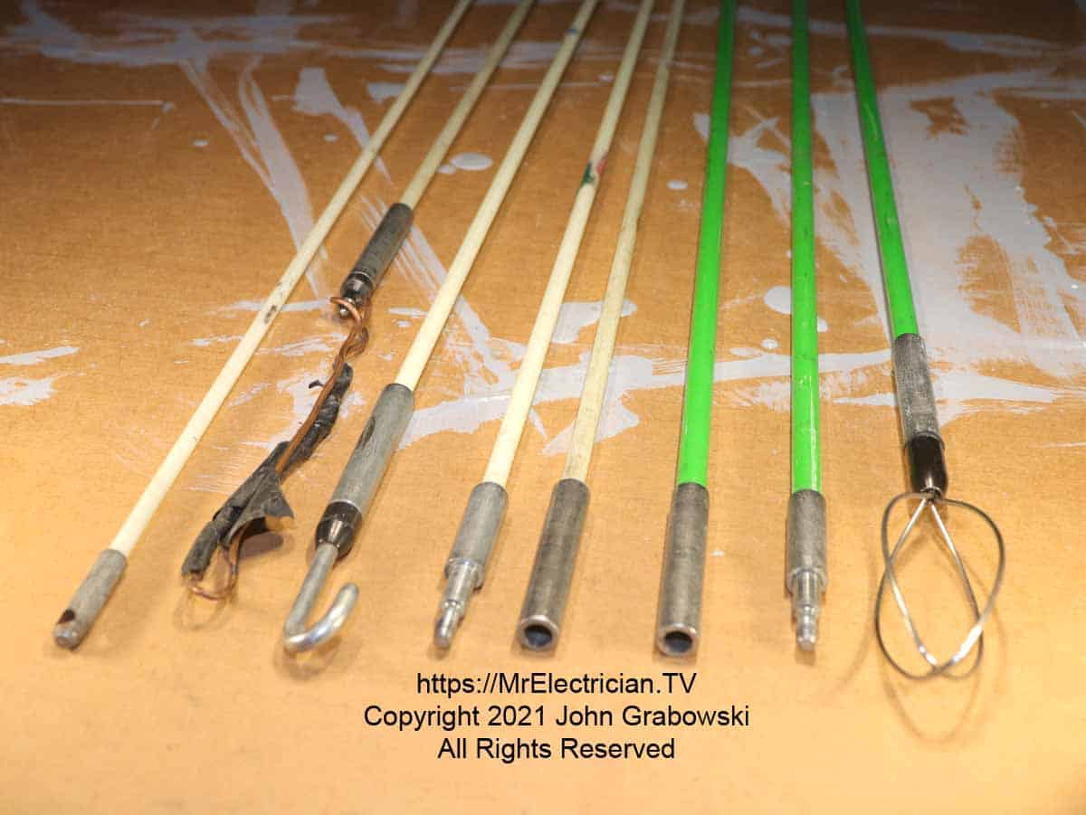 Assorted wire pulling fish rods with various wire pulling attachments
