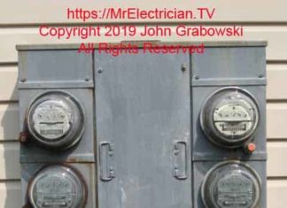 Rusted four-gang electric meter socket base