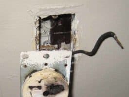 A burned 220 volt, 30 amp electrical receptacle
