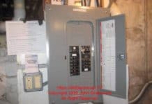 Completed generator sub-panel with a Square D generator interlock between the utility power main circuit breaker and the generator circuit breaker