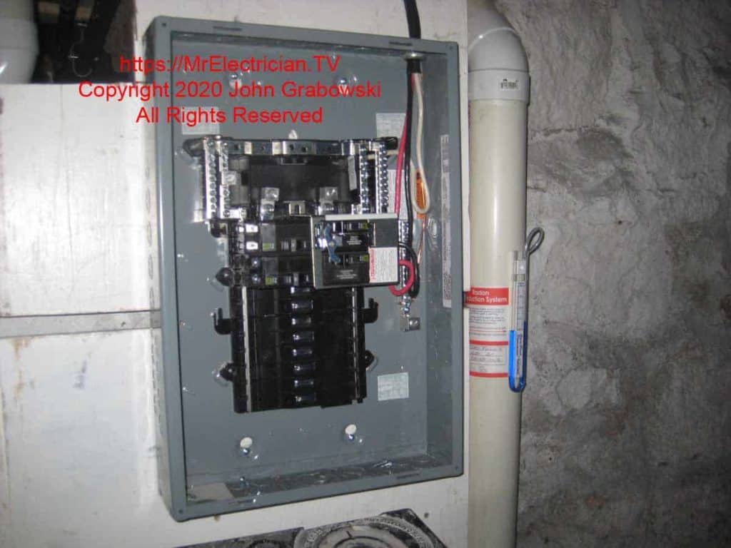 Interior of a Square D load center being used as a generator sub-panel