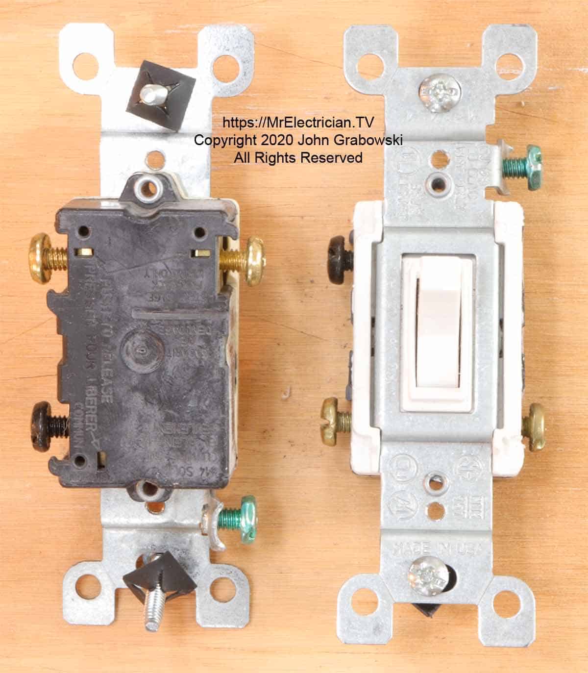 Front and back of two identical three-way switches