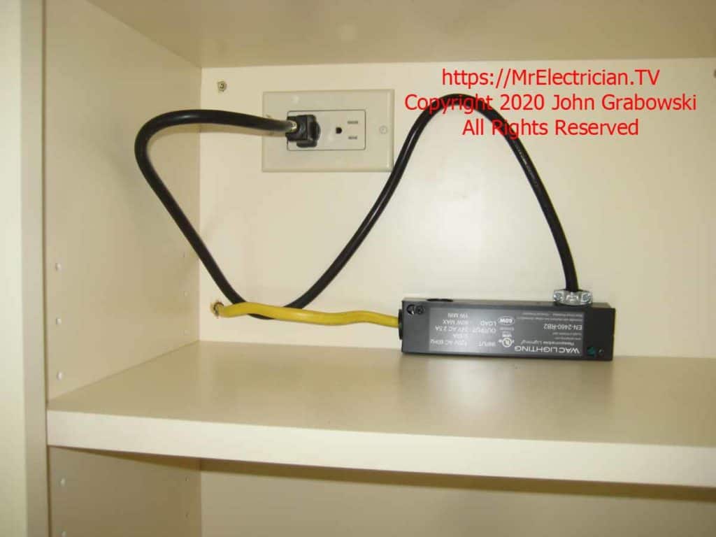 Low voltage lighting transformer that powers the recessed lights in the kitchen cabinet
