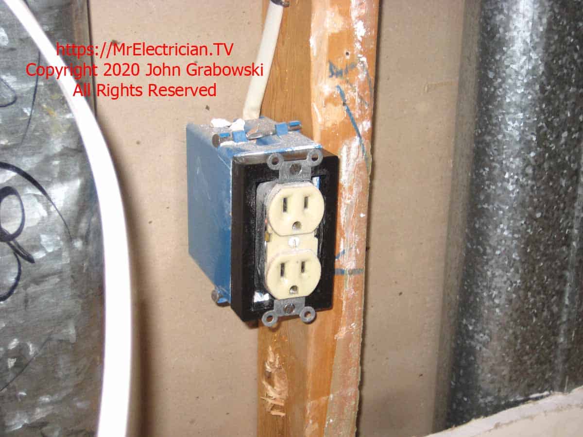 Existing kitchen outlet box with a one-gang, 3/4" ReceptXtender electrical box extender to push the outlet to the new wall depth