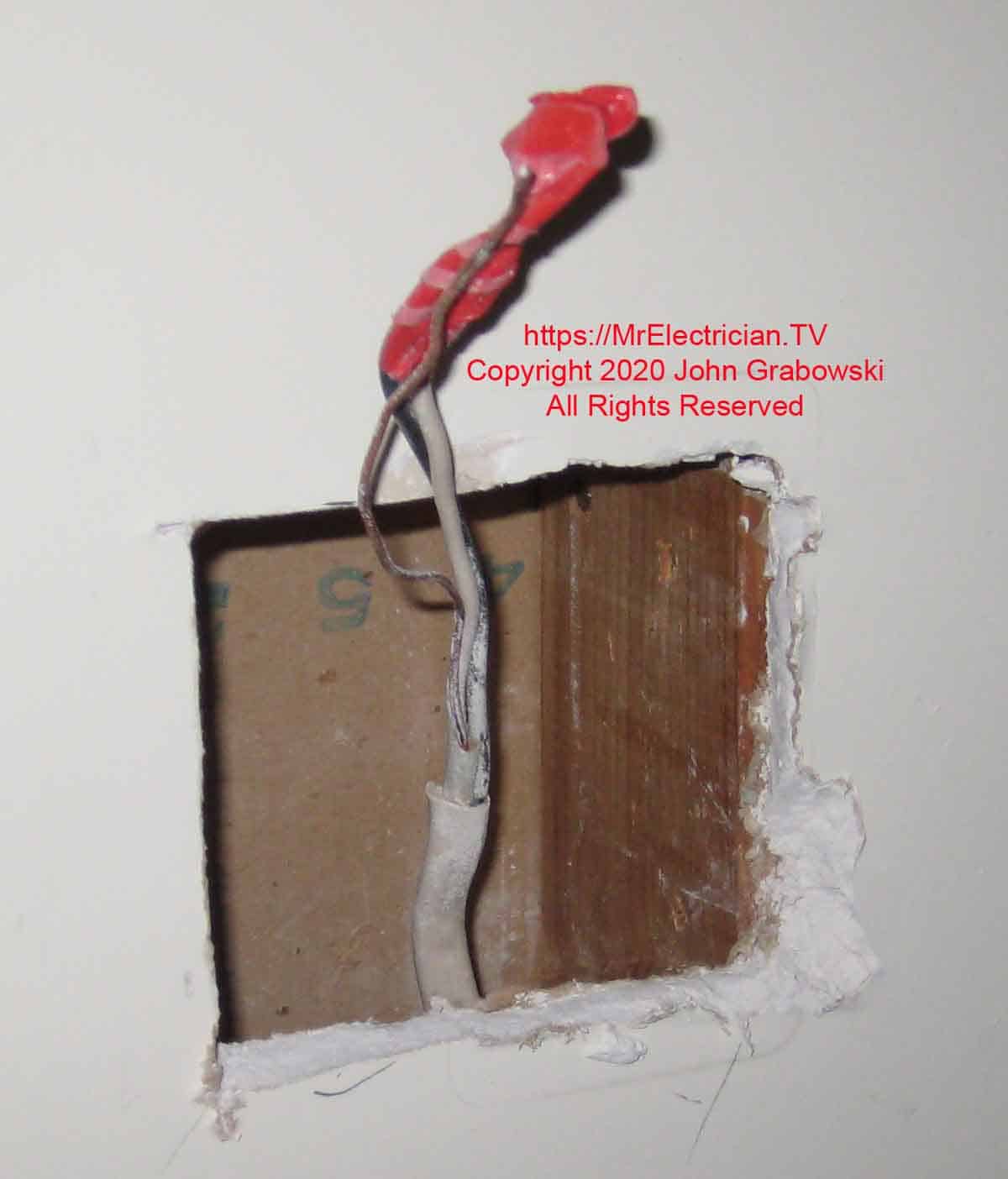 Old one gang switch box removed and hole enlarged for a new two gang plastic old work electrical box