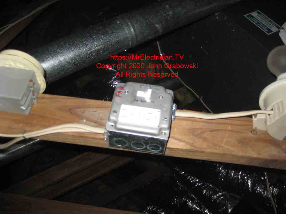 A newly installed attic fan shut off switch and a GFCI outlet for servicing