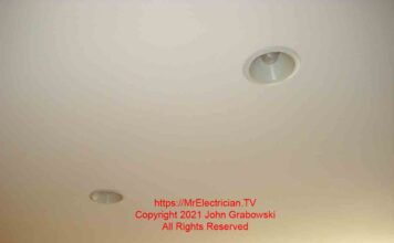 Recessed lights before being removed for the installation of pendant lights