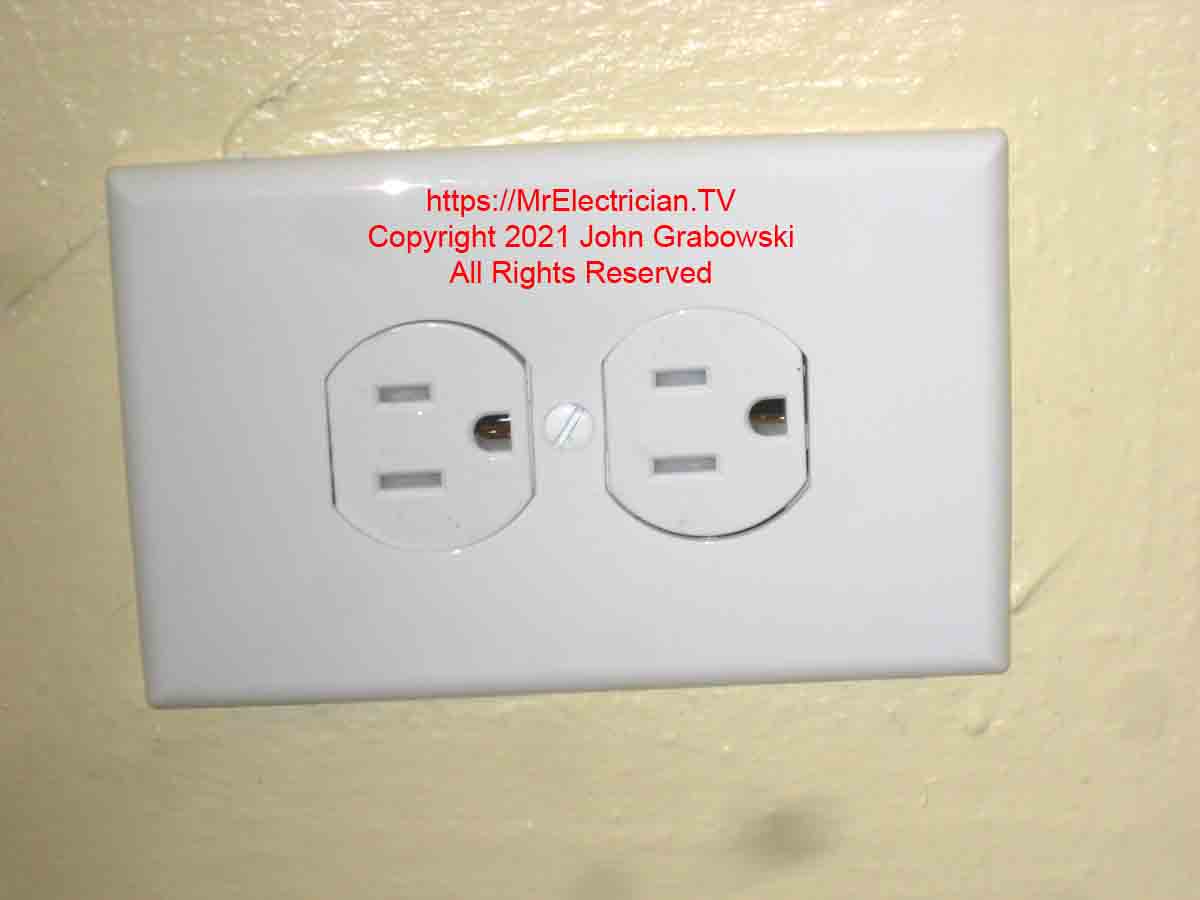 The completed replacement of a two-prong non-grounded electrical receptacle outlet with a new tamper-resistant three-prong outlet.