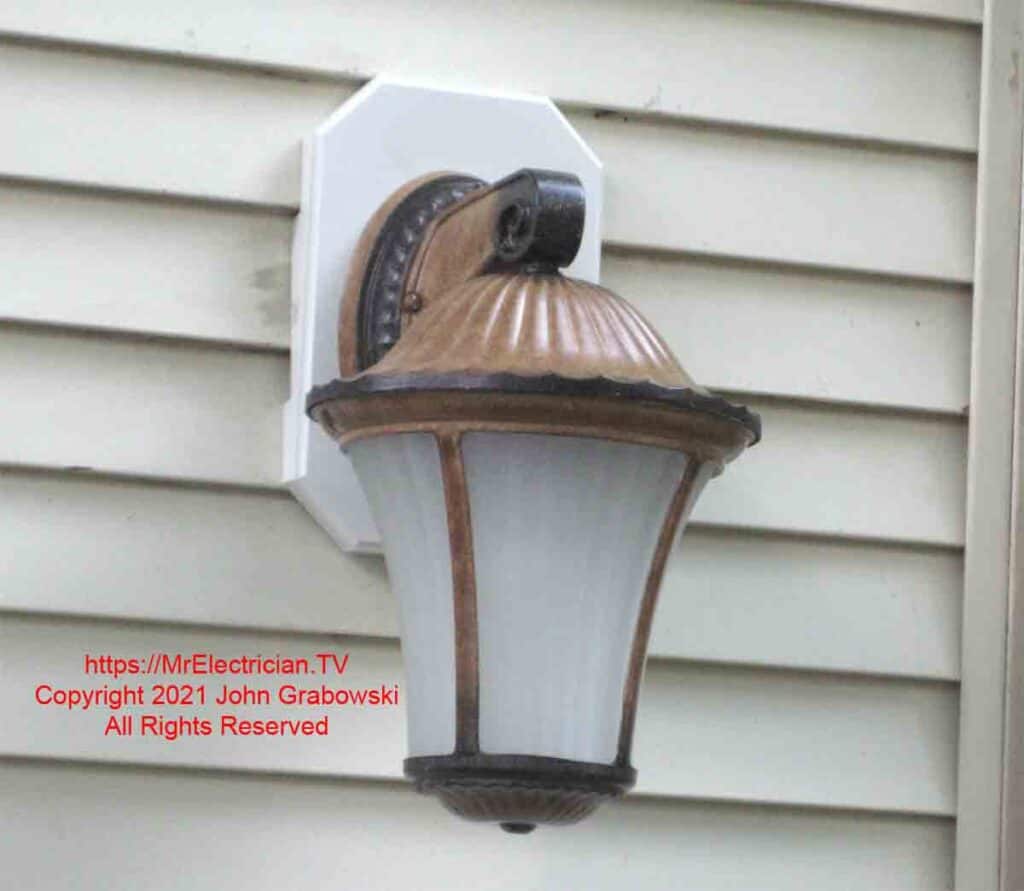 The completed repair and replacement of an outdoor fixture