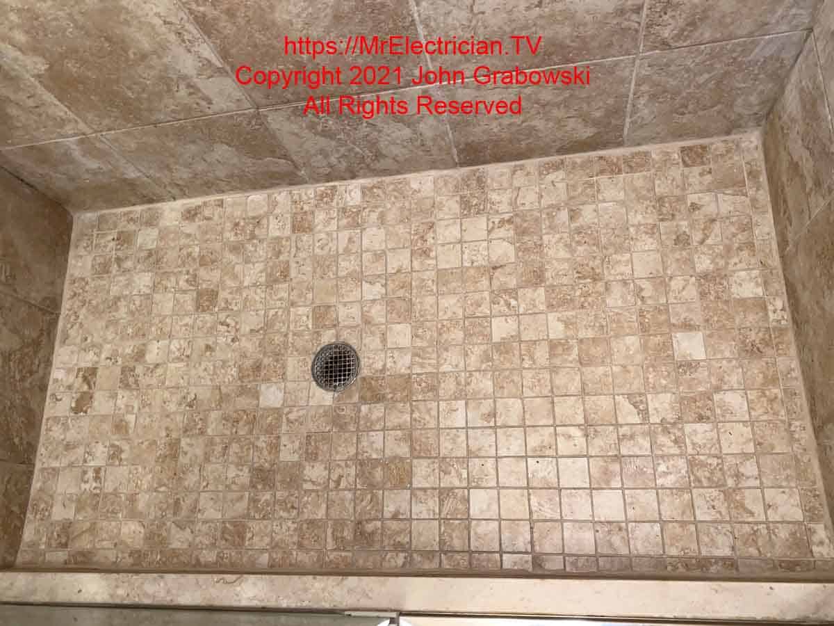 The finished product from how I re-grouted a shower floor with Laticrete Spectralock Pro Premium Epoxy Grout