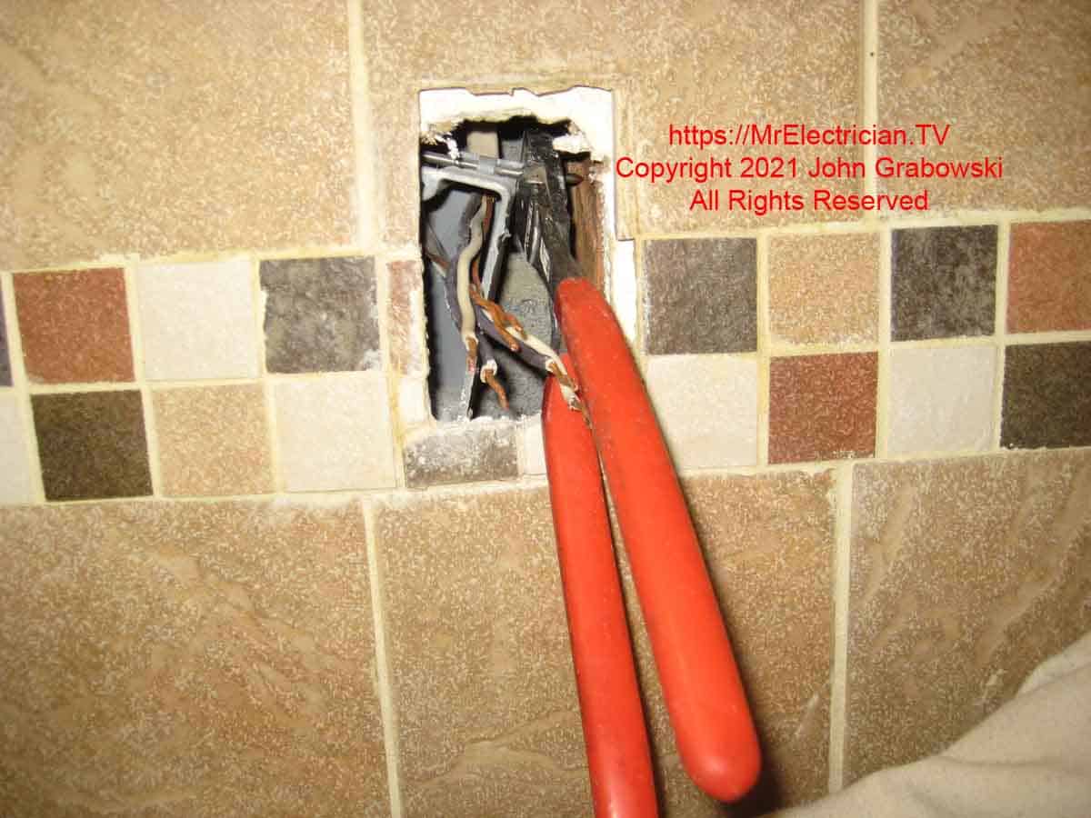 Knipex high leverage diagonal pliers were used to cut the nails on the outlet box still in the wall