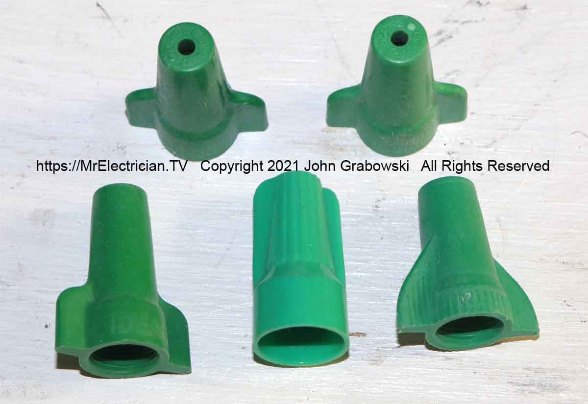 Some samples of green grounding wire connectors