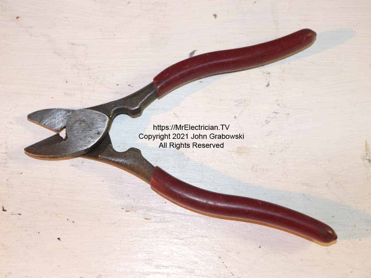 A pair of BX cutting pliers with the jaws open. CLICK to see on Amazon