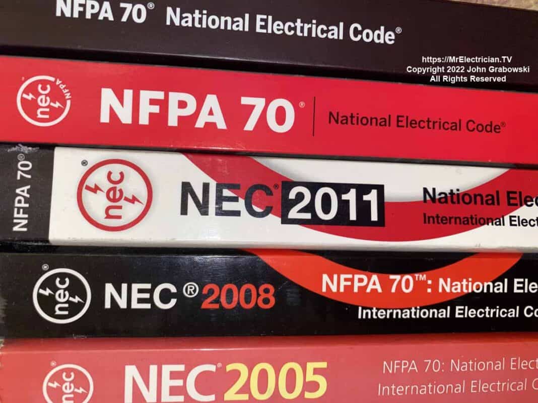 The spines of a few National Electrical Code books