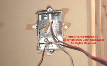 A rough-in wired wall switch electrical box