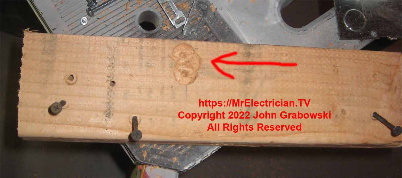 A short piece of wood stud for an electrical box to be attached