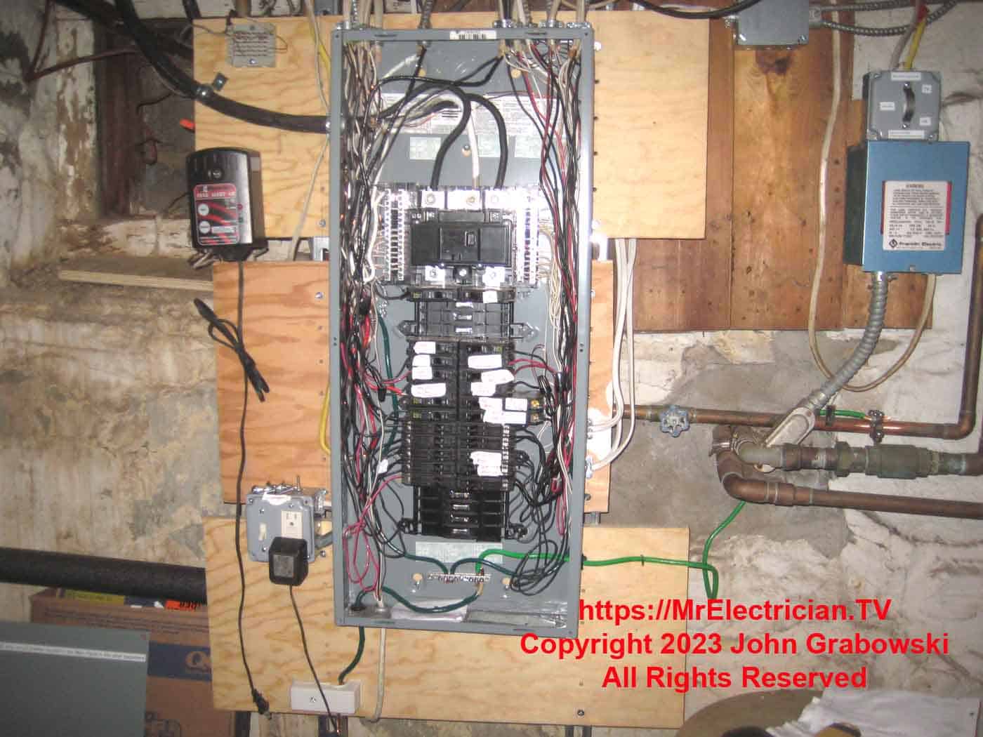 A new basement Square D sub-panel to replace two older sub-panels.