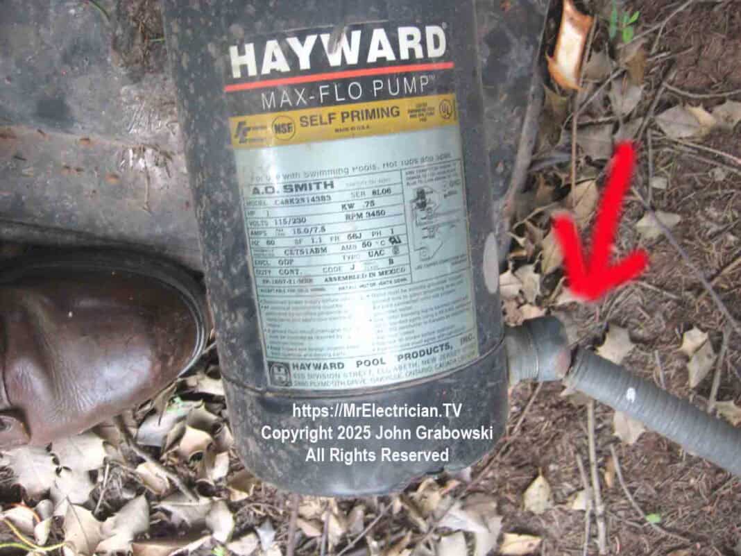 An example of a swimming pool pump motor with a broken electrical conduit connection and no equipotential bonding. This has the possibility of causing electric shock drowning.