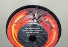 A Broan #157, 1250 watt, round surface mounted, fan forced ceiling heater is easily mounted to a standard round or octagonal ceiling electrical box with a dedicated 15 or 20 amp, 120 volt electrical circuit. The round heating element is red hot and heat is pushed downward with a small internal fan.