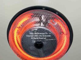 A Broan #157, 1250 watt, round surface mounted, fan forced ceiling heater is easily mounted to a standard round or octagonal ceiling electrical box with a dedicated 15 or 20 amp, 120 volt electrical circuit. The round heating element is red hot and heat is pushed downward with a small internal fan.