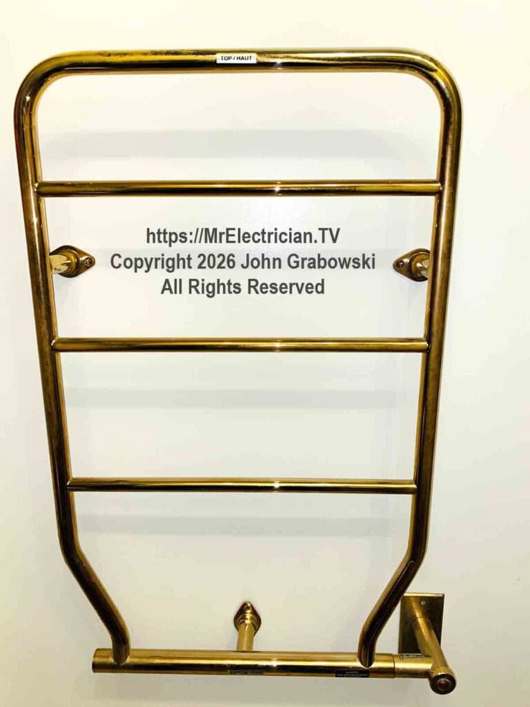 A brass plated electrically heated towel rack that puts out a small amount of heat depending on the model, but is not usually used for room heat on its own. A brass plated electrically heated towel rack that puts out a small amount of heat depending on the model, but is not usually used for room heat on its own.