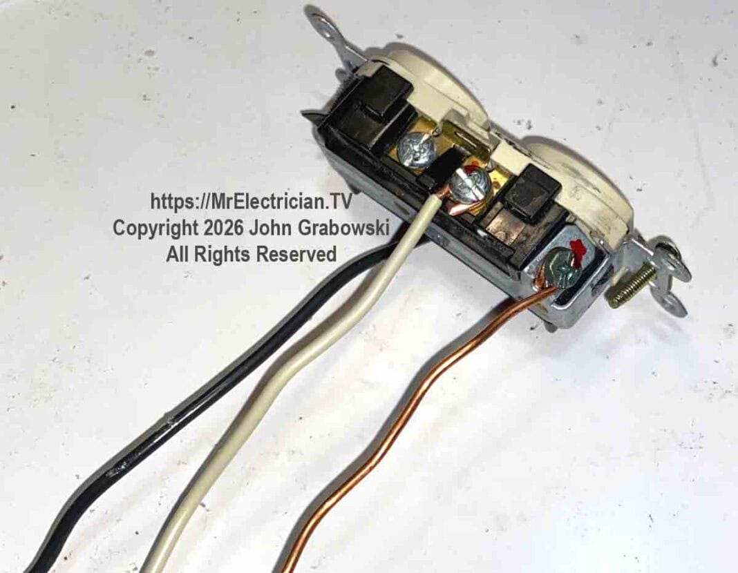 An electrical receptacle outlet with pigtails preinstalled and ready to be spliced inside the electrical box