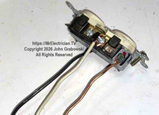 An electrical receptacle outlet with pigtails preinstalled and ready to be spliced inside the electrical box