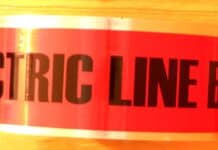 Marking Tape A side view of a roll of red underground electrical marking tape