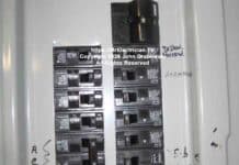 A group of circuit breakers inside a Murray 200 amp circuit breaker panel